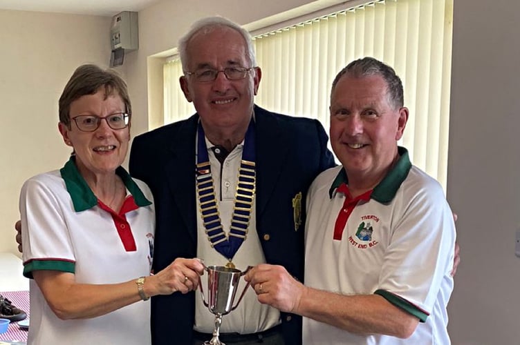 The winners of the Couples Bowls Tournament, Nikki and Terri, being presented with the Partridge Cup by Morchard Bishop President Richard Tapp. 
