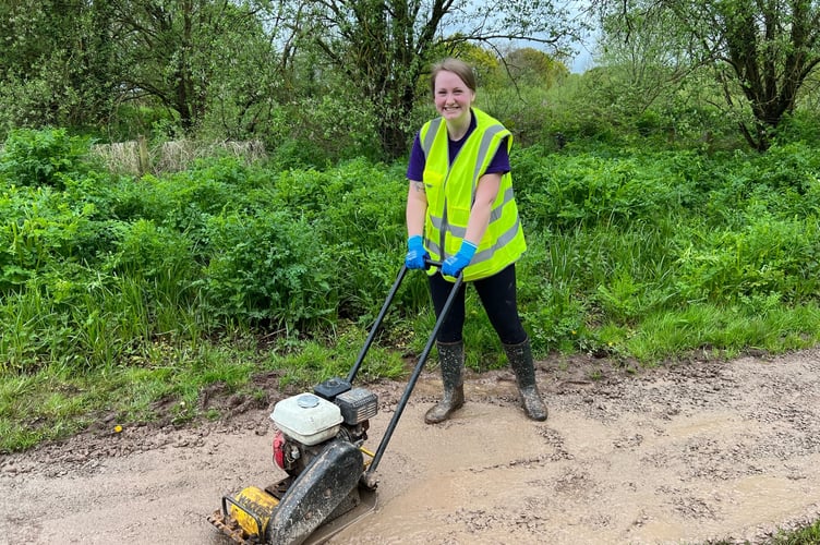 An Ernest Jackson volunteer helping with the Spring Makeover at Sandford Millennium Green.