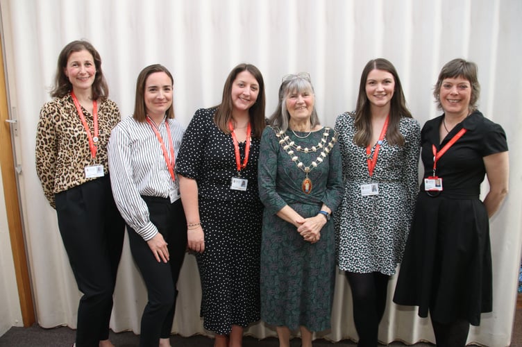 The Mayor of Crediton, Cllr Liz Brookes-Hocking, fourth left, with from left, Crediton Town Council staff, Jo Davey, projects officer, Emily Armitage, receptionist, Town Clerk Rachel Avery and from fifth left, Emma Anderson, Assistant Clerk and right, Cath Kelly, Lead Youth Worker. AQ 4312