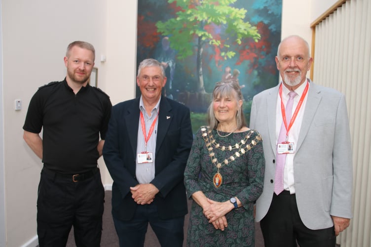 The Mayor of Crediton, Cllr Liz Brookes-Hocking, with, from left, Inspector Mark Arthurs, Cllr Guy Cochran and right, Cllr Steve Huxtable. AQ 4318