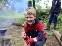 Primary pupils learn bushcraft skills 