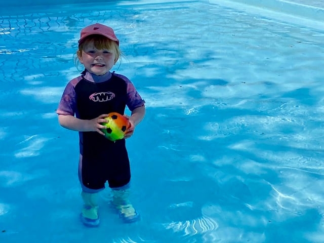 One of the first youngsters in the paddling pool when it opened for the summer in Newcombes Meadow last year. NP 260523 01 (Crediton Courier)
