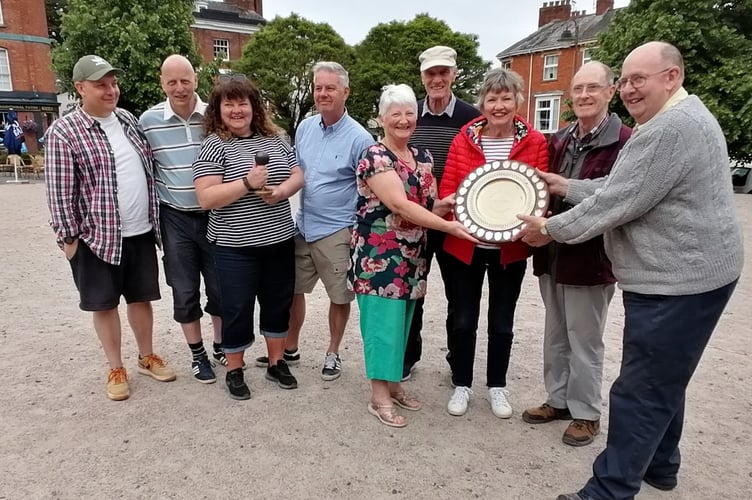 Winners and Runners-Up with competition organiser Peter Brewer, right, presenting the winning trophy.