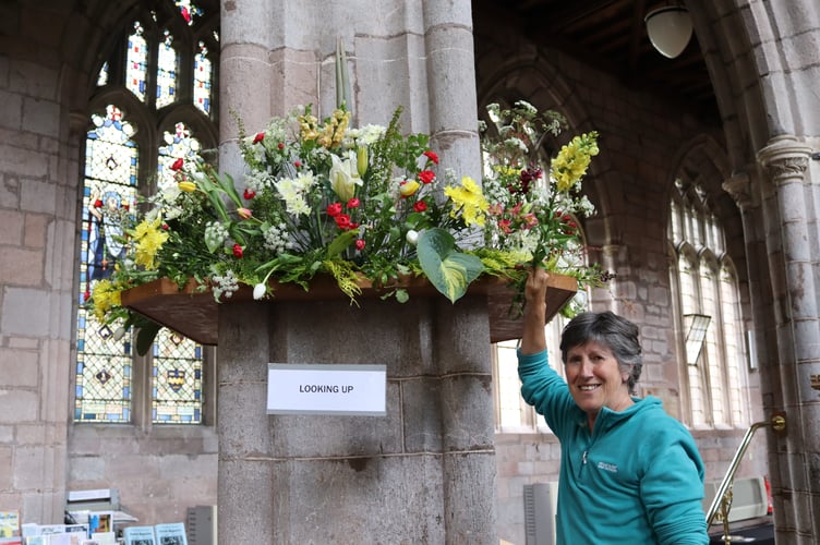 Gina Osborne arranged the pillar decorations