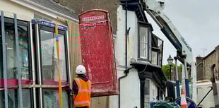 Red telephone box removed from town square