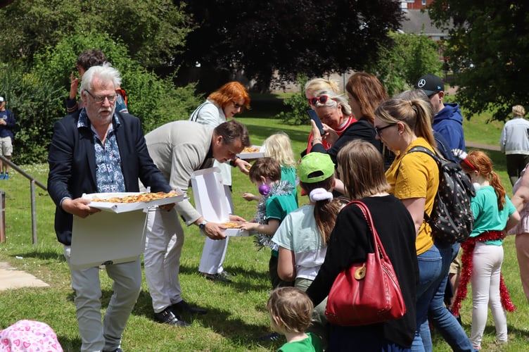 Handing out Boniface buns