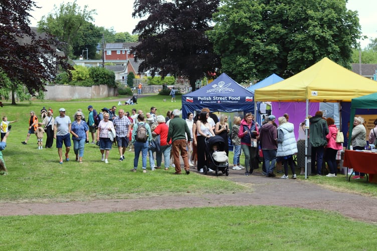 People enjoying various stalls