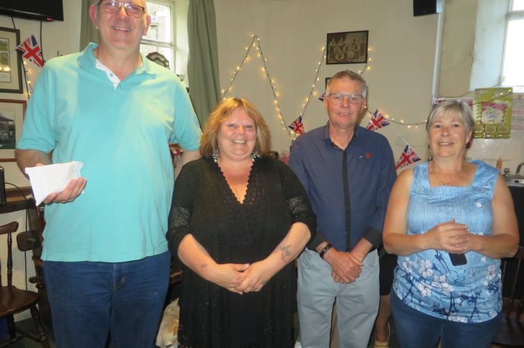 Presentation of £1,000 to Ian Mansfield, left, and Kevin James of North Tawton Veterans