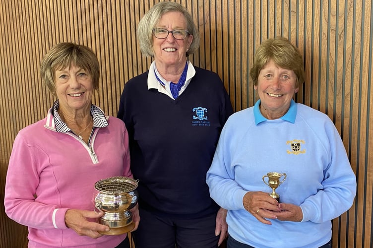 Linda Gill, left and Lyn Parry, right, with their awards and Shirley Stunnell, Downes Crediton Golf Club Ladies Secretary.
