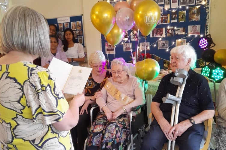 The chairman of Morchard Bishop Parish Council read out the card from the King and Queen.