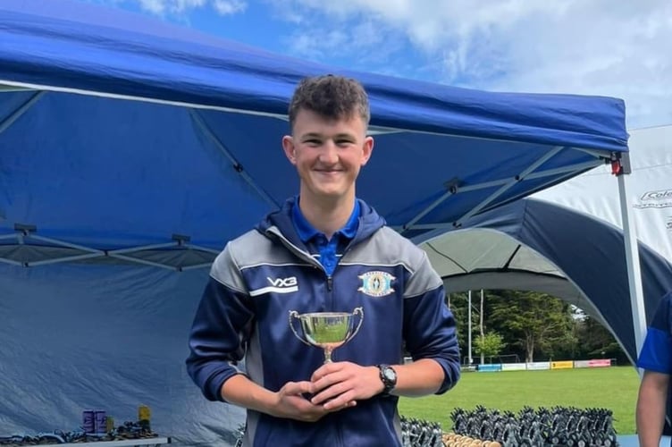 Reece Burnison with the Eakers Cup