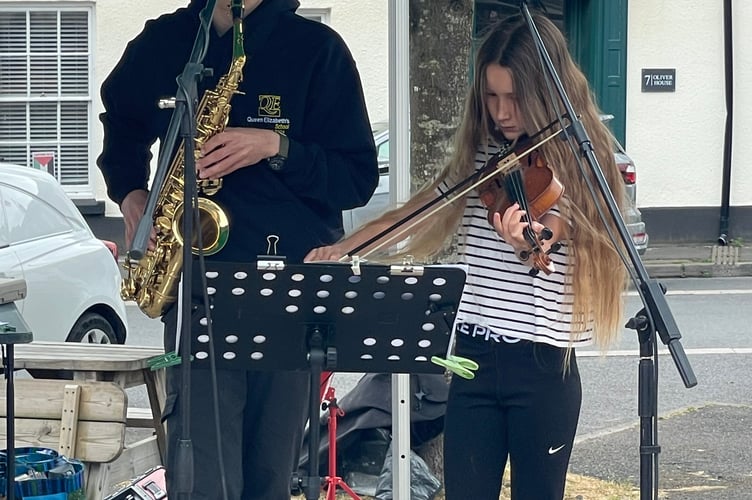 Two young performers taking part in Busk It! AQ 5607