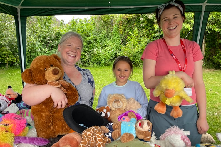 One young person won three teddy bears at the Teddy Bear Tombola. AQ 5541