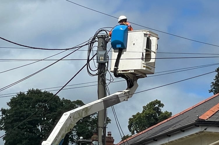 A National Grid engineer at work in Searle Street this afternoon, June 27. AQ 6066