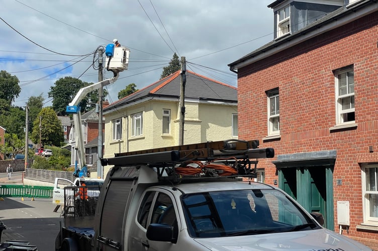 A National Grid engineer at work in Searle Street this afternoon, June 27. AQ 6069
