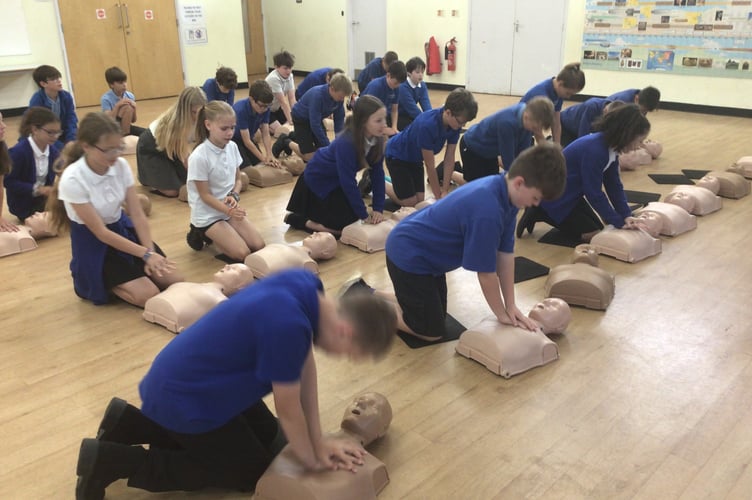 During CPR training at Landscore Primary School.