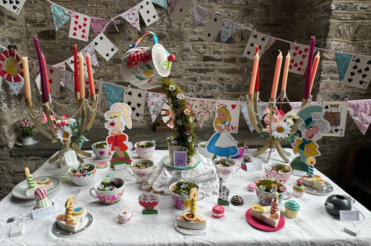 Films was the theme of the flowers festival and this was ‘The Mad Hatter’s Tea Party’ by Coldridge Toddler Group. AQ 6192