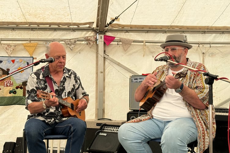 Musician entertaining at Coldridge Fete. AQ 6336