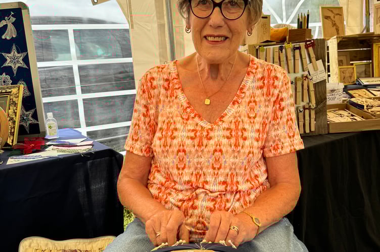 Daphne Pottle demonstrated Honiton Lace making at the fete. AQ 6223
