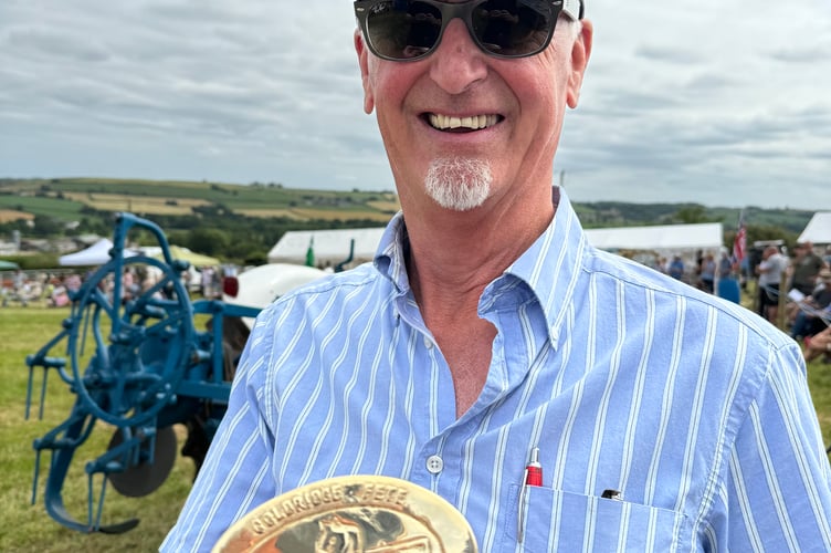 Vintage tractor owners were given a brass plaque to thank them for attending. AQ 6422