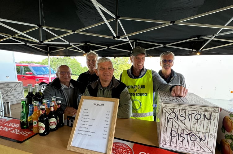 Rotarians ran the bar for the Proms at Downes. AQ 7068