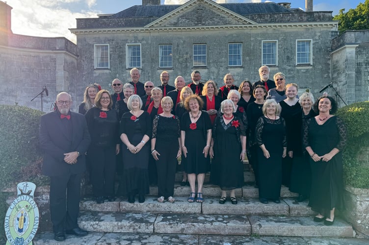 Tedburn Community Choir with right, Musical Director Karen Scott.  AQ 7102