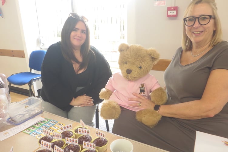 With chocolate cup cakes at Tedburn St Mary Village Hall open day were Sara Smale and Hannah from Sara’s School Pre-School. SR 3474