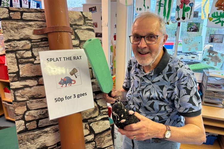 Mike Downer ran the Splat the Rat game. AQ 7924