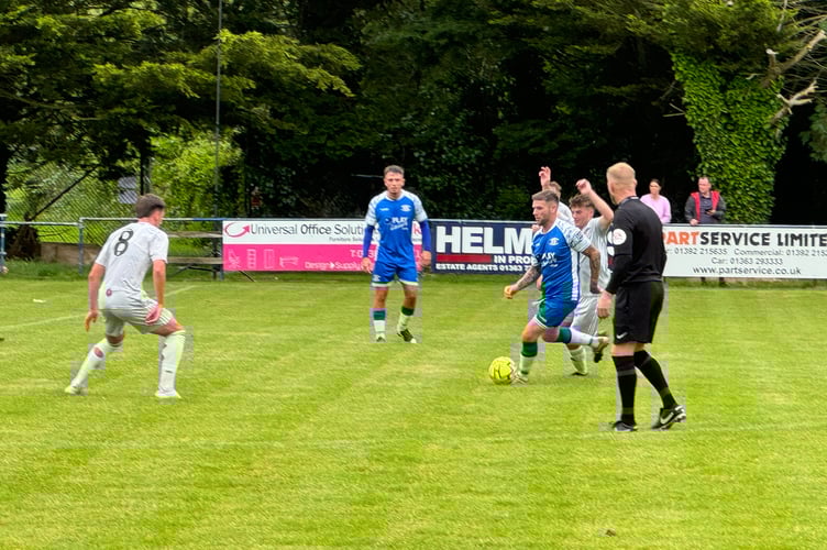 Crediton in possession during the match v Exeter City FC Academy side. AQ 8004
