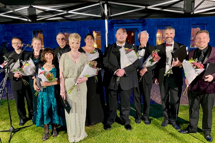 Staircase Opera and the floral gifts they received.  
