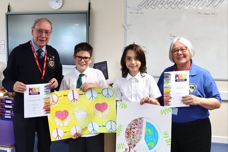 Copplestone winner Mykola Samoilenko, second from right, with runner-up Toby Camp and Eric Parkes and Ann Whitehouse of Crediton Lions Club