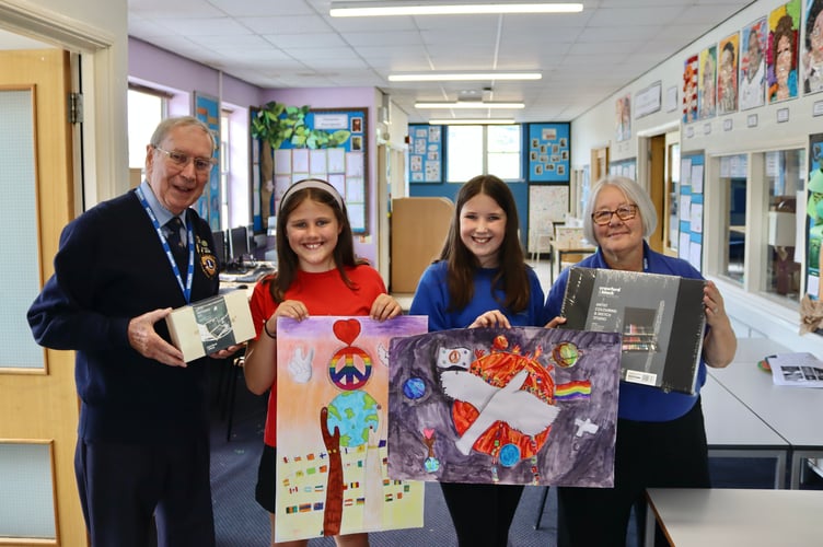 Landscore winner Sophie Trenaman, second from right, with runner-up Emilia Zieleniewski and Eric Parkes and Ann Whitehouse of Crediton Lions Club