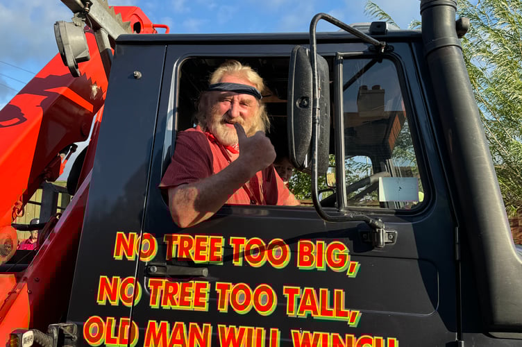 A thumbs up from Mr Butt with his vehicle in the procession.  AQ 8724