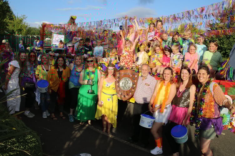 Cheriton Fitzpaine Pre-School received the champion award, presented by Bill Tonkin.  AQ 4935