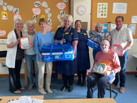 Crediton Hospital Friends League purchases bags for community nurses
