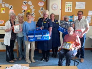 Crediton Hospital Friends League purchases bags for community nurses
