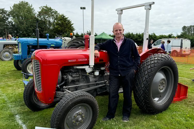 James Turner with his 1964 Massey Ferguson 35X. AQ 9044