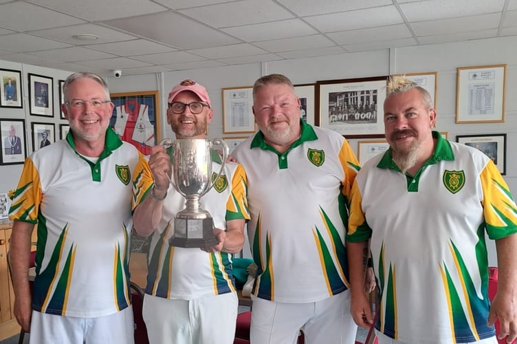 Steve Jones, Allan Gibb, John Harry and Pete Sheppard with trophy