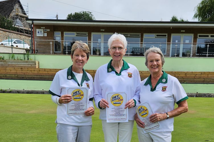 Janet Edwards, Jane Beresford Smith and Jan Summers proudly displaying their certificates after scoring a maximum of nine shots in a single end in a Ladies Triple League match.