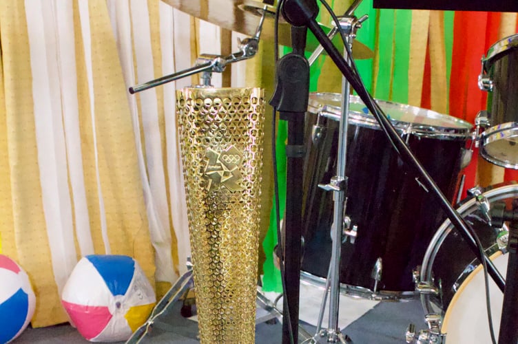 Real London 2012 Olympic Torch carried by Peter Brewer in Ilfracombe