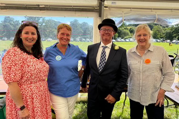 Chagford Show Officers, from left, new secretary Tiggy Fuller, retiring secretary Penny Keen, President Mark Svensson and right, chairman Judith Colton. AQ 0759