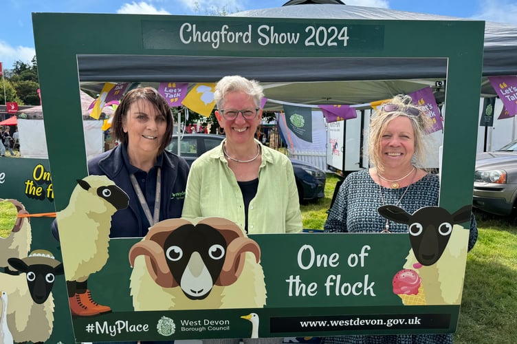 West Devon Borough Council stand was busy, manned by, from left, Dil Lord, Cllr Jan Elliott (Chagford ward) and Susannah Hunter. AQ 0689