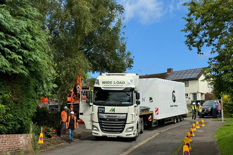 The lorry with one of the Zed Pods ready to be taken from the low-loader by crane.  AQ 9267
