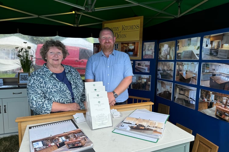 Country Kitchens of Devon were kept busy talking to prospective customers at Chagford Show. AQ 0719