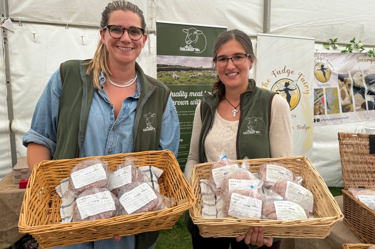 Steph and Alice sold meat boxes, burgers and sausages, from the native and rare breed sheep and pigs produced by Salt of the Earth from Sourton near Okehampton. AQ 0644