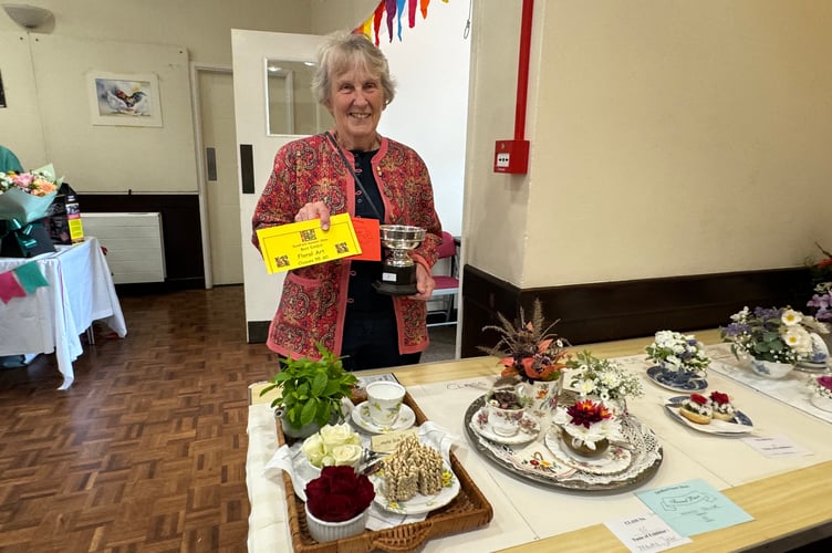 Sally West won the trophy for Best Floral Exhibit award.  AQ 1552
