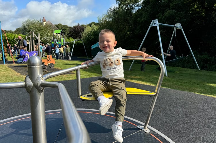 Freddie (3), enjoying the new play equipment at Coleford. AQ 1398