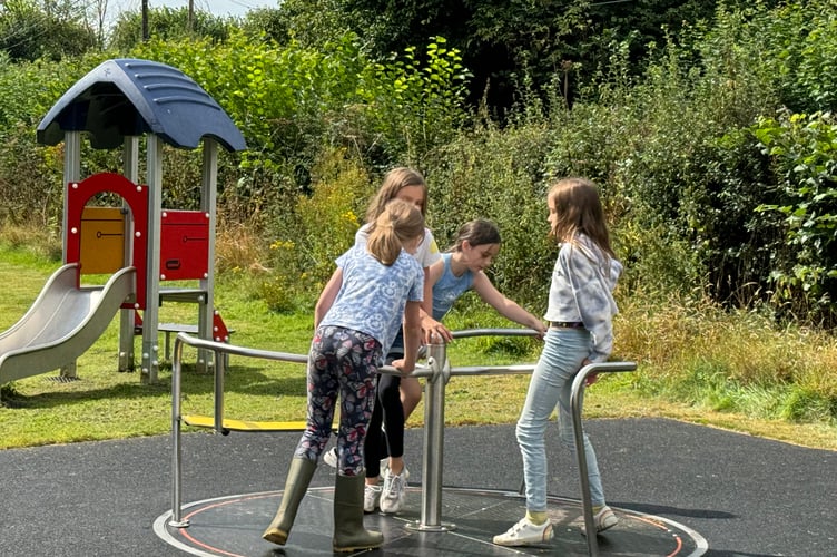 A popular roundabout is one of the new items of equipment. AQ 1418