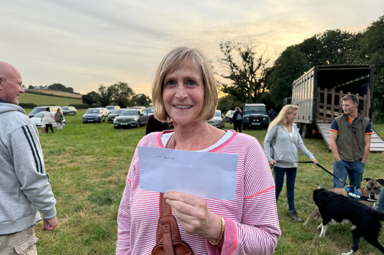 Paula Lewis with her prize after her duck won the duck race. AQ 1631