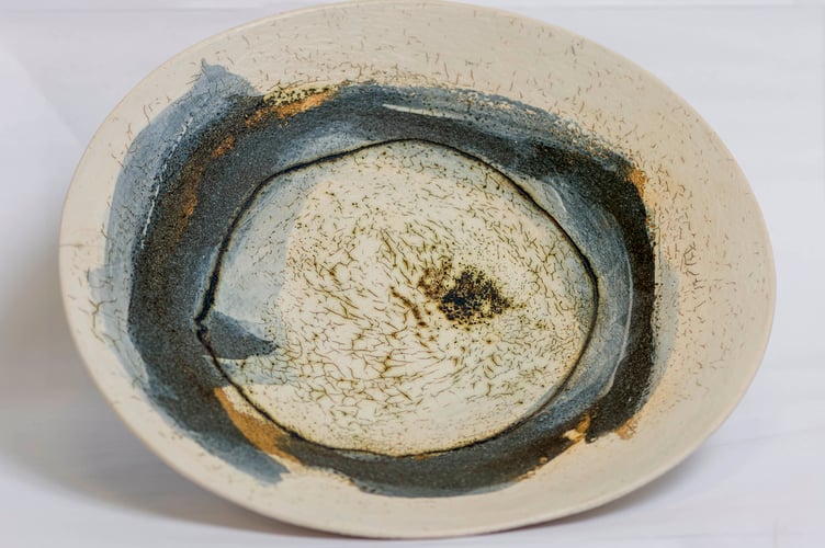 A stoneware form bowl by Laurel Keeley.